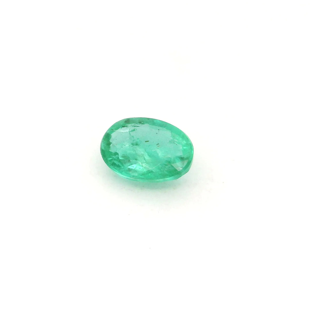 0.77ct Oval Natural Emerald (Colour Green, Clarity Slightly Included, Cut Faceted)