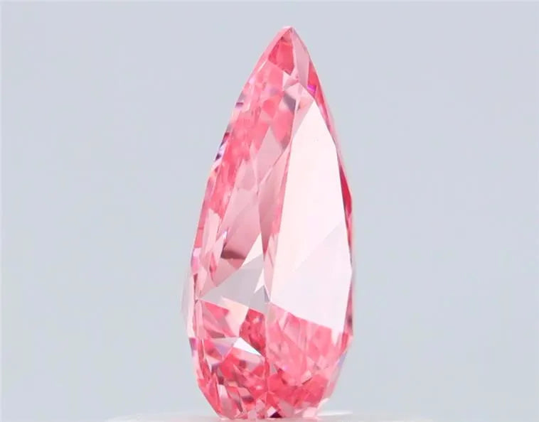 0.55ct Pear Natural Diamond (Colour Fancy Intense Pink, Clarity VS1, Cut VG, IGI Certified)