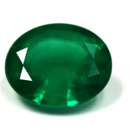 12.21ct Oval Natural Emerald (Colour Green, Clarity Slightly Included, Cut Faceted)