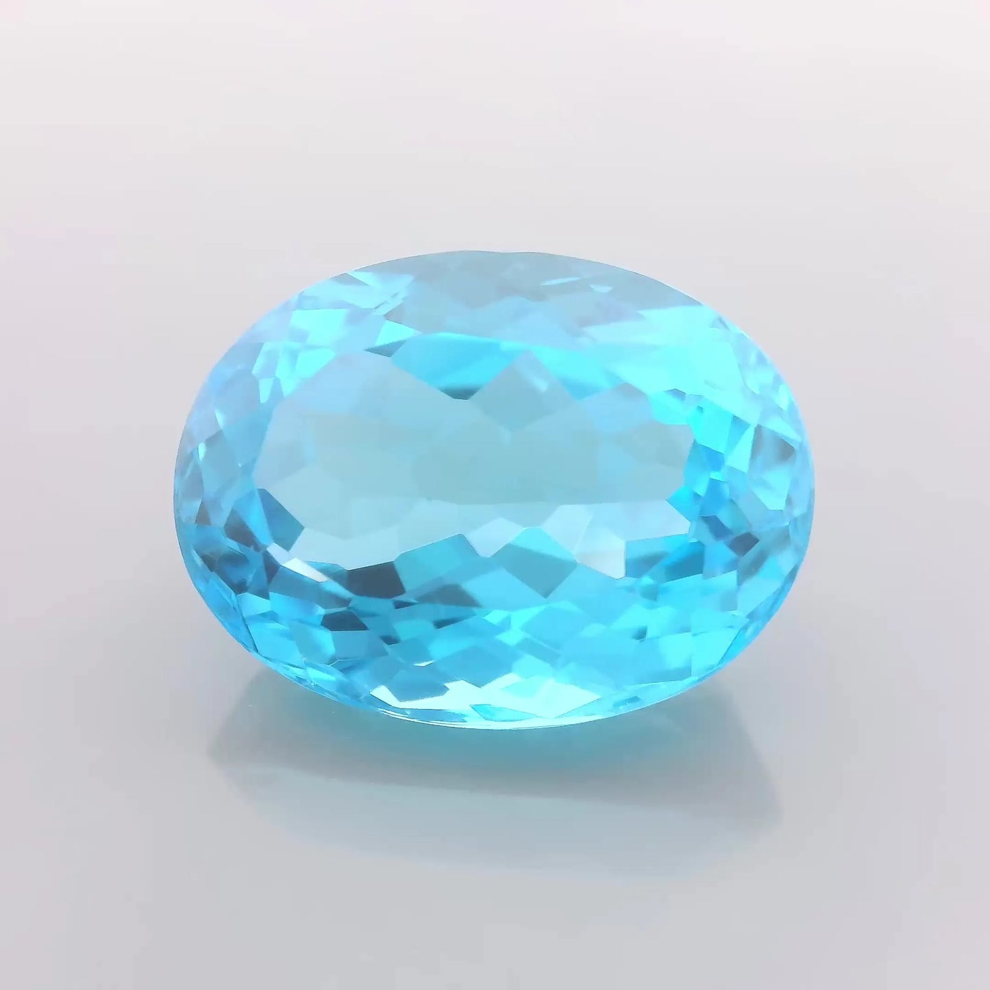 25.26ct Oval Natural Topaz (Colour Blue, Clarity Eye Clean, Cut Faceted)