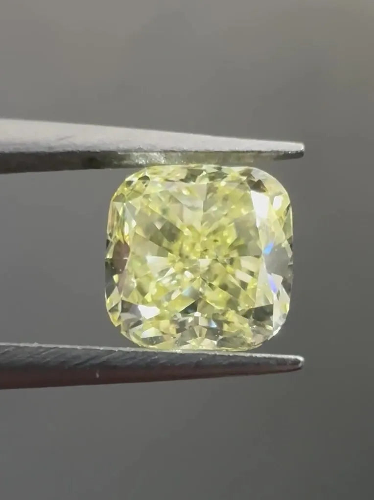 0.63ct Cushion modified Natural Diamond (Colour Fancy Light Yellow, Clarity SI1, GIA Certified)