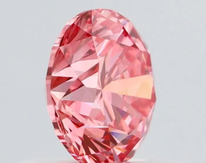 0.68ct Round Natural Diamond (Colour Fancy Intense Pink, Clarity VS1, Cut VG, IGI Certified)