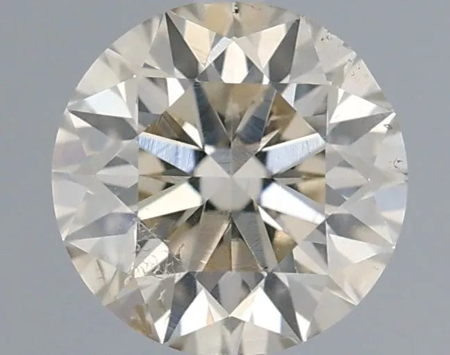 0.70ct Round Natural Diamond (Colour L, Clarity SI1, Cut EX, IGI Certified)