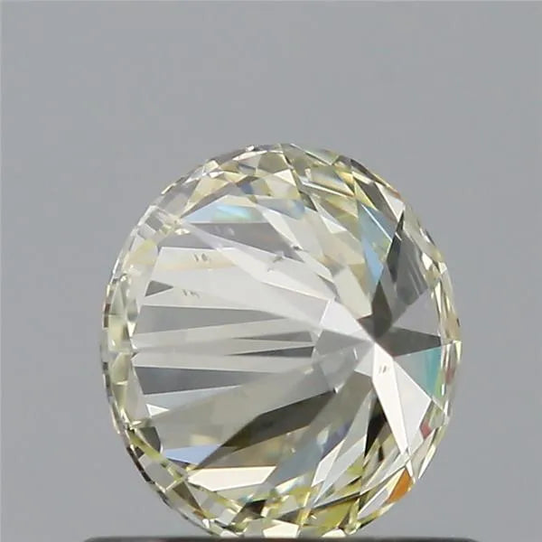 0.70ct Round Natural Diamond (Colour M, Clarity VS2, Cut EX, IGI Certified)