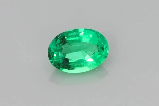 0.71ct Oval Natural Emerald (Colour Green, Clarity Slightly Included, Cut Faceted)