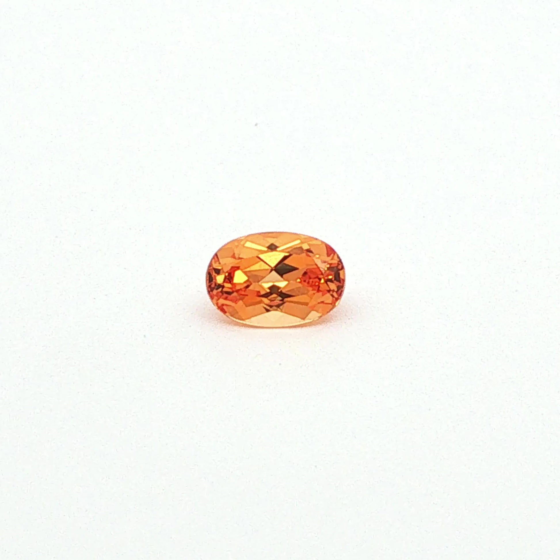 0.75ct Oval Natural Garnet (Colour Orange, Clarity Eye Clean, Cut Faceted)