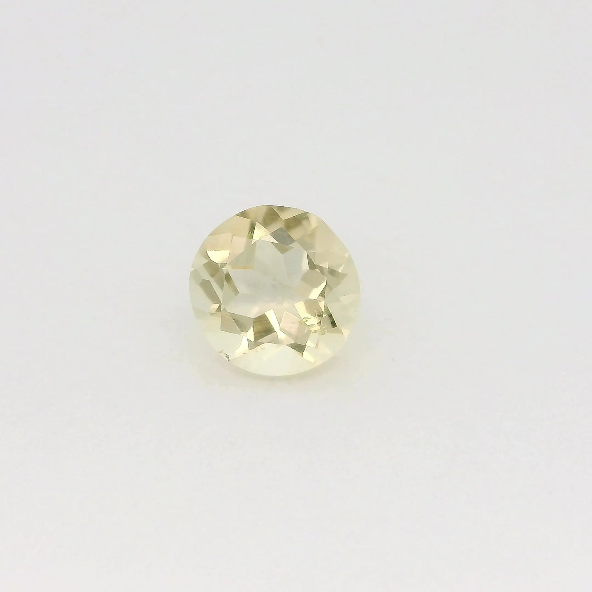 0.75ct Round Natural Citrine (Colour Yellow, Clarity Slightly Included, Cut Faceted)