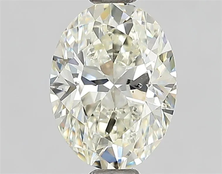 0.90ct Oval Natural Diamond (Colour K, Clarity SI1, GIA Certified)