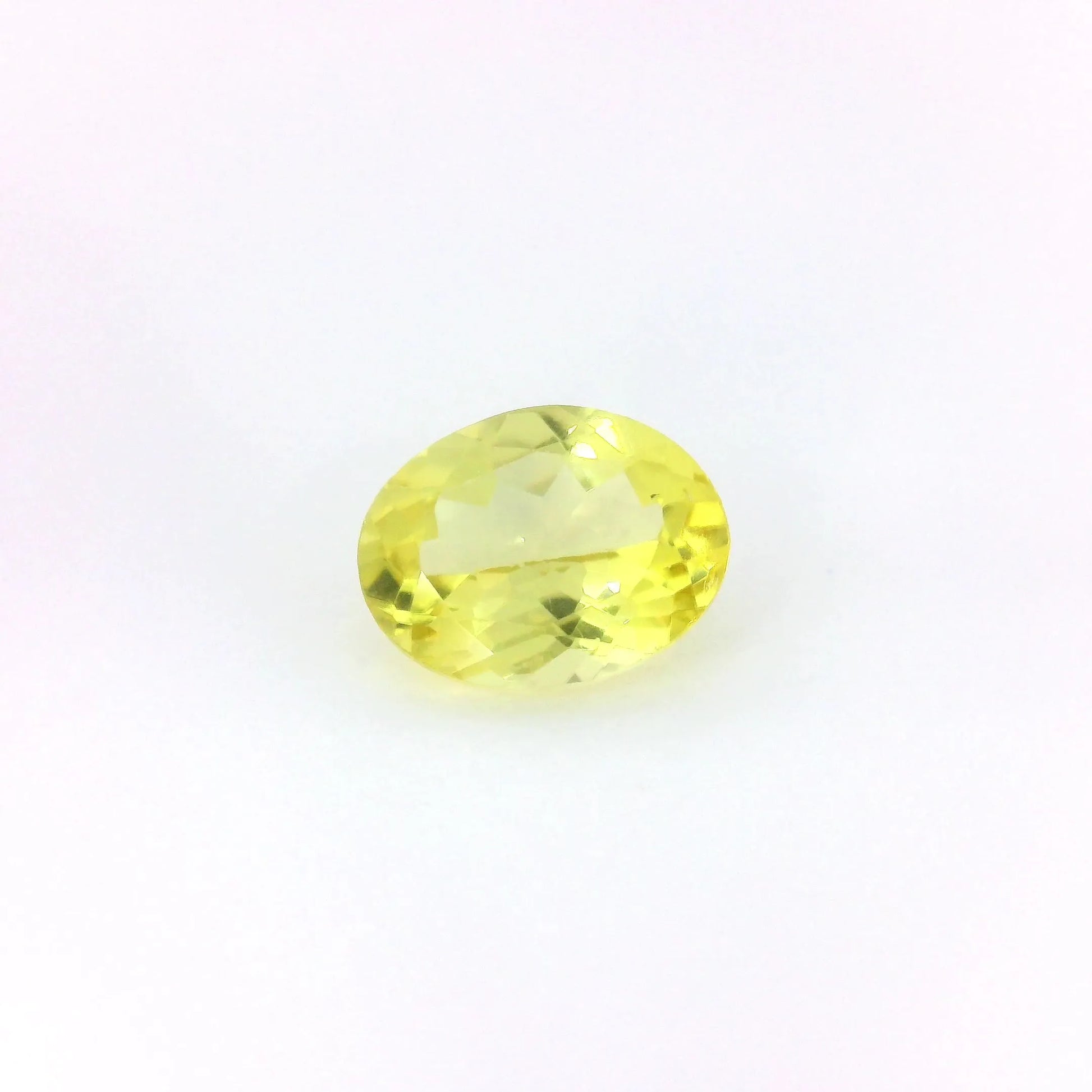 1.58ct Oval Natural Apatite (Colour Yellow, Clarity Eye Clean, Cut Faceted)
