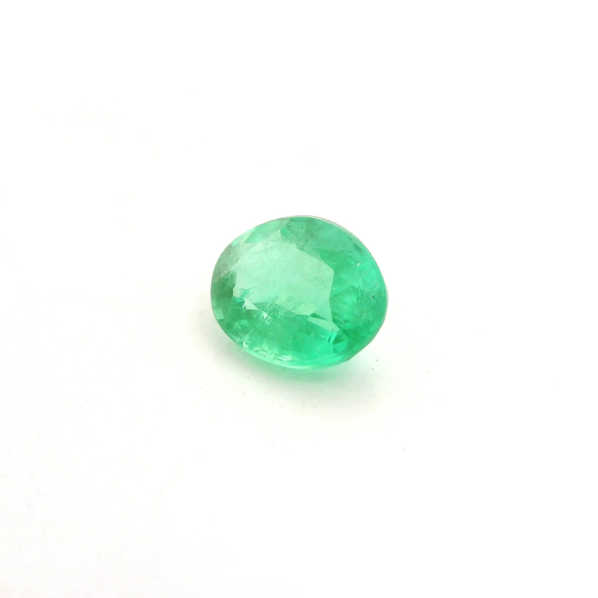 1.65ct Oval Natural Emerald (Colour Green, Clarity Slightly Included, Cut Faceted)