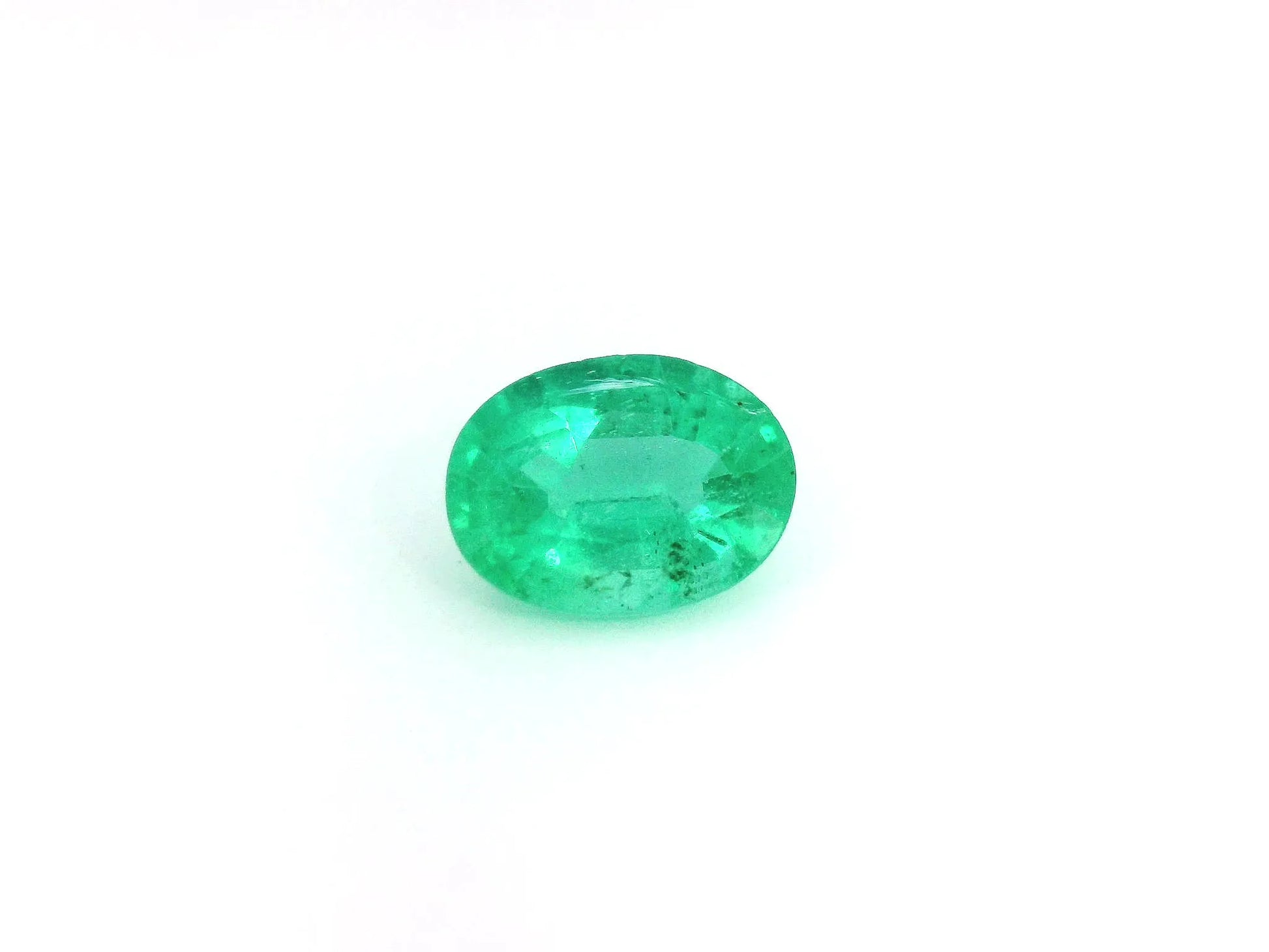 1.71ct Oval Natural Emerald (Colour Green, Clarity Slightly Included, Cut Faceted)