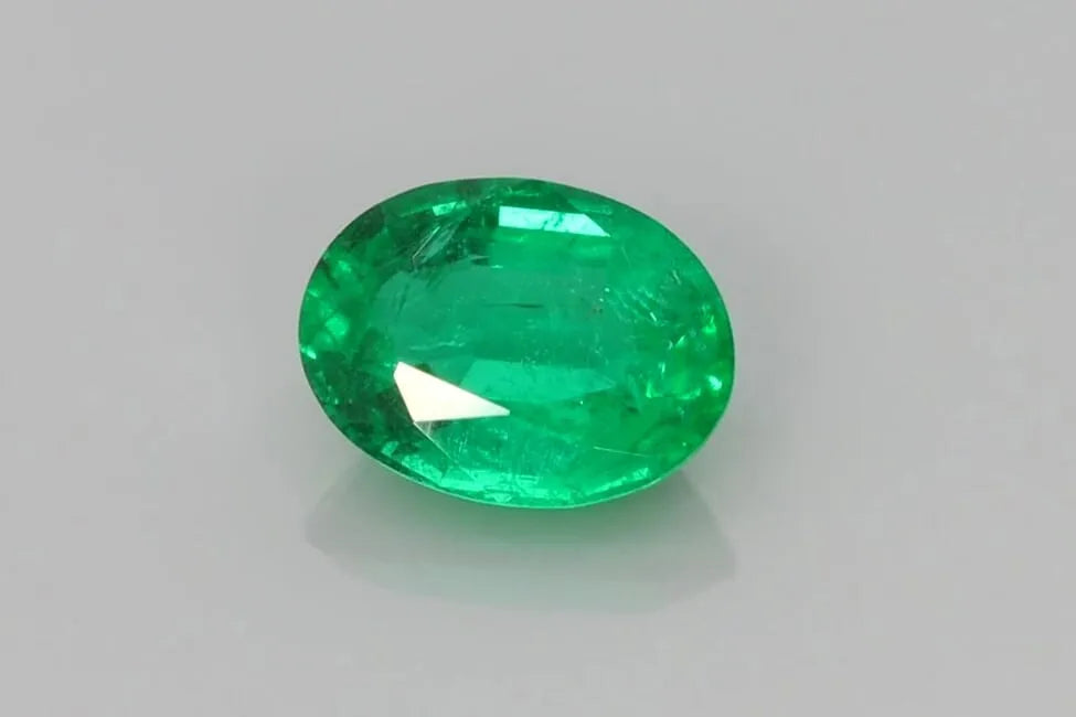 1.21ct Oval Natural Emerald (Colour Green, Clarity Slightly Included, Cut Faceted)