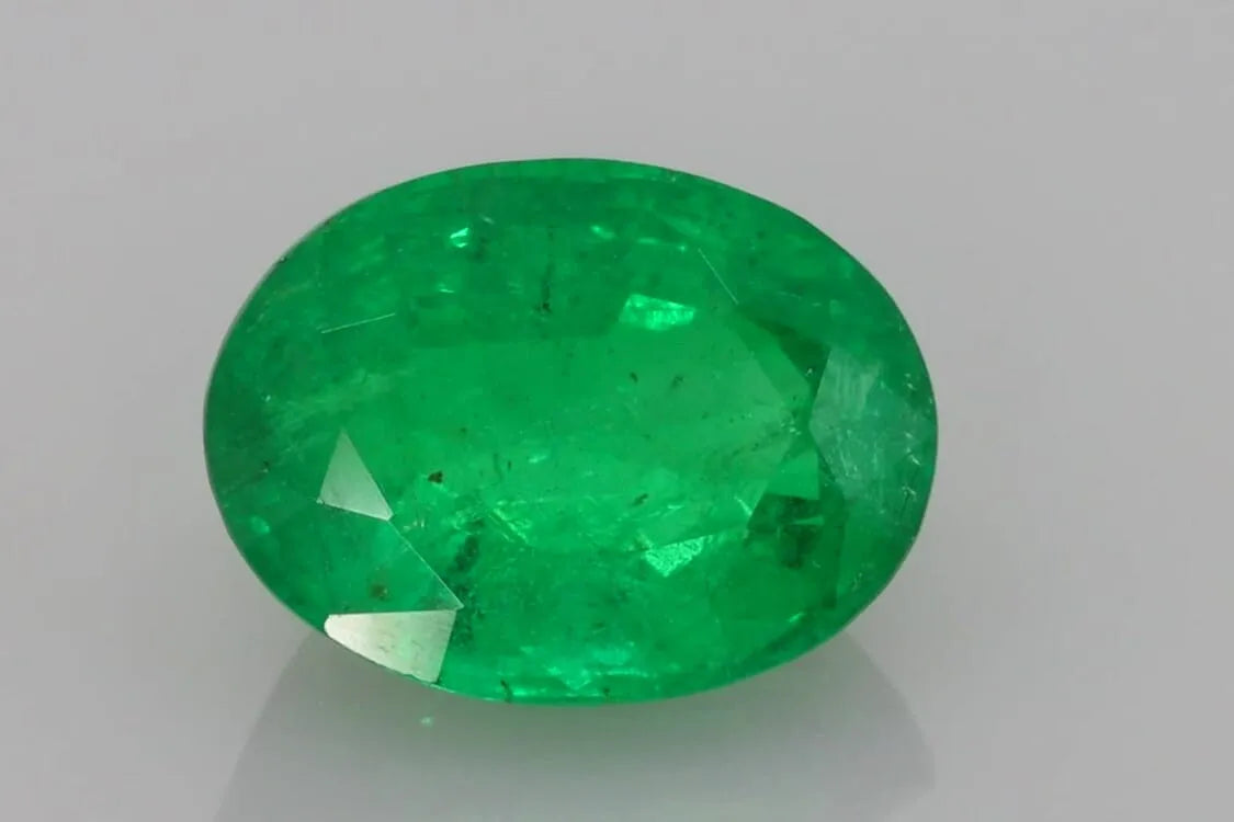 4.93ct Oval Natural Emerald (Colour Green, Clarity Slightly Included, Cut Faceted)
