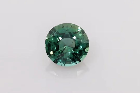 1.39ct Round Natural Sapphire (Colour Multicolor, Clarity Slightly Included, Cut Faceted)