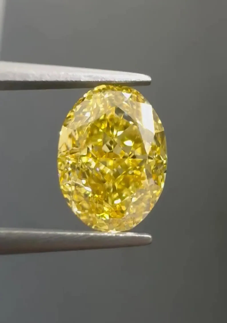 2.04ct Oval Natural Diamond (Colour Fancy Intense Orangey Yellow, Clarity VS1, GIA Certified)