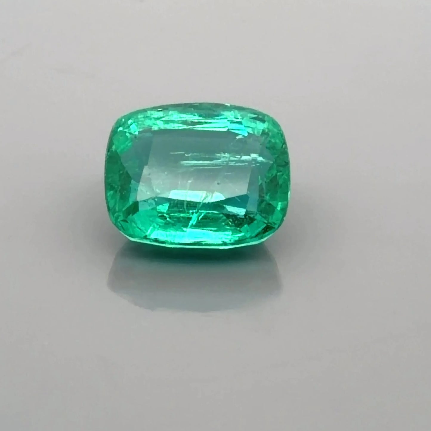 4.41ct Cushion Natural Emerald (Colour Green, Clarity Moderately Included, Cut Faceted)