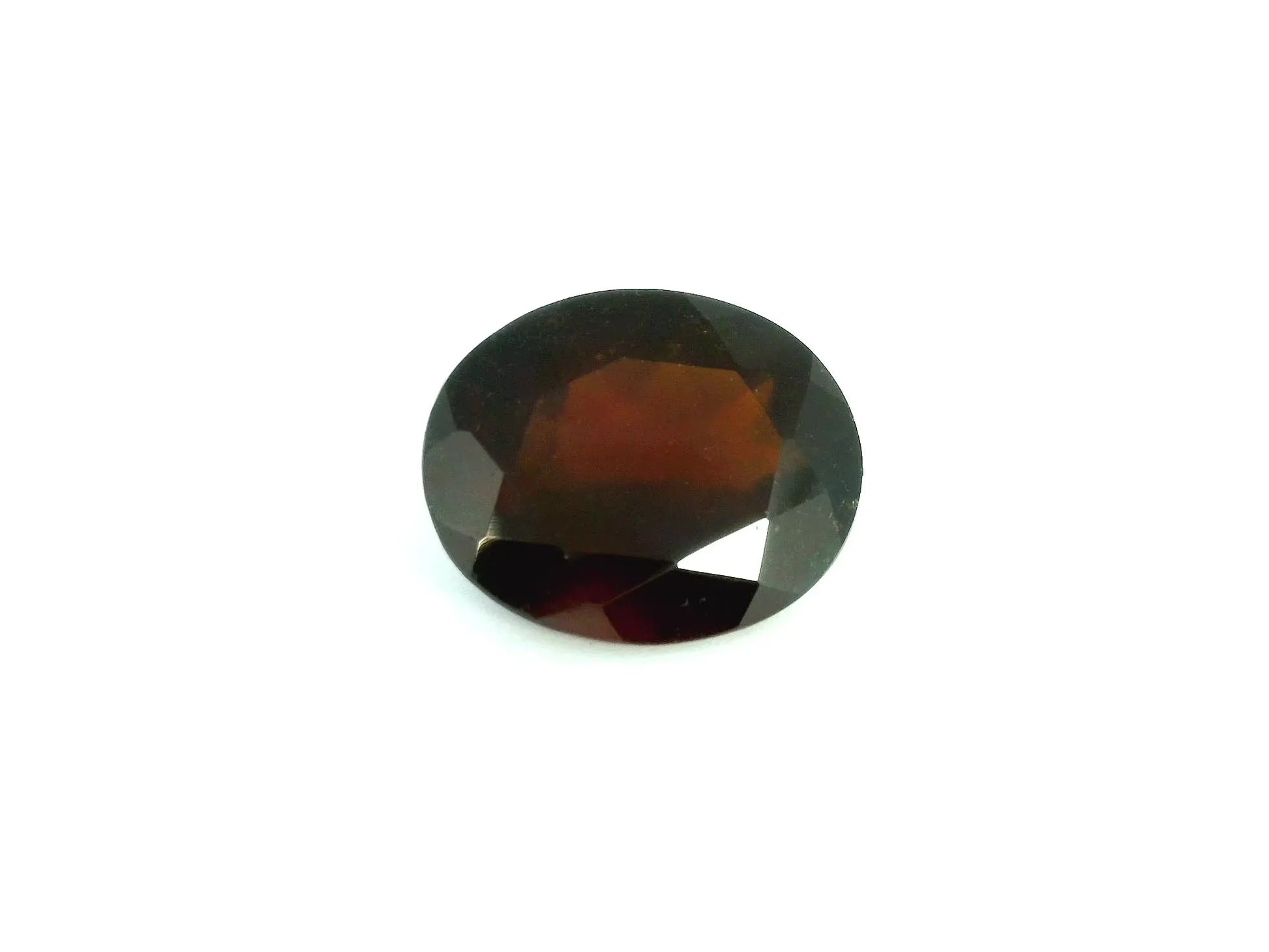 5.14ct Oval Natural Garnet (Colour Orange, Clarity Slightly Included, Cut Faceted)