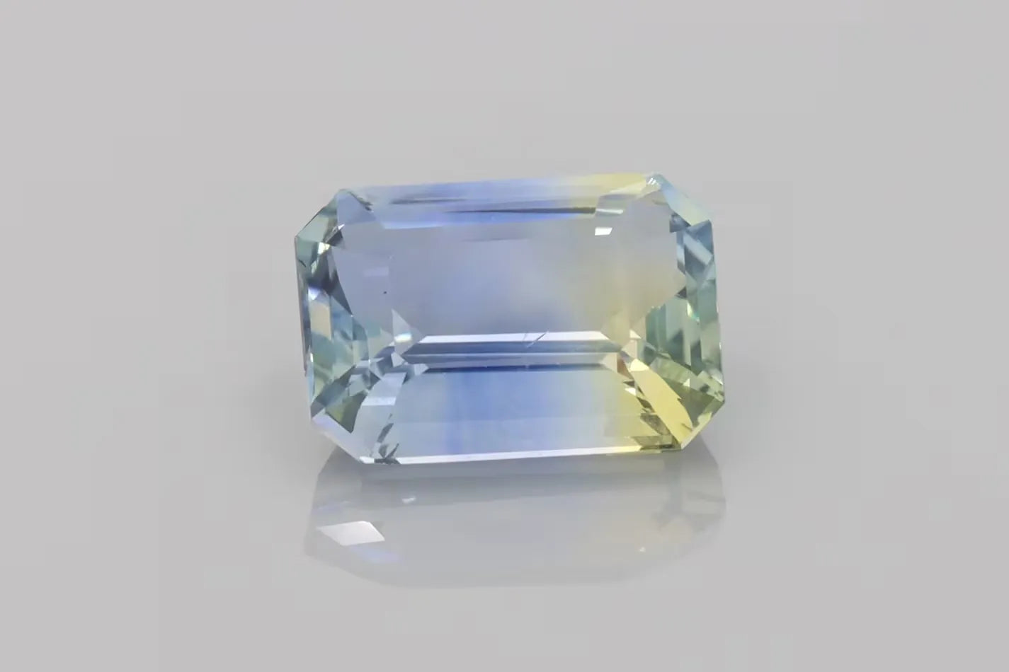 7.05ct Emerald Natural Sapphire (Colour Bicolor, Clarity Eye Clean, Cut Faceted)